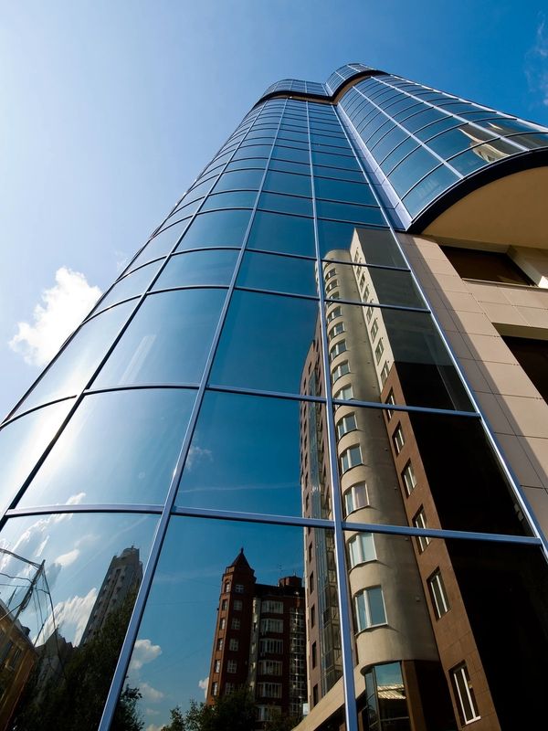 Modern commercial buildings viewed from street level