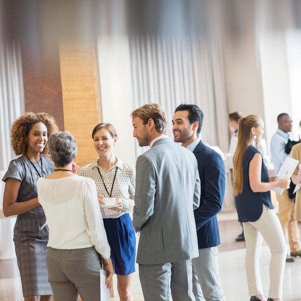 People talking at a business gathering