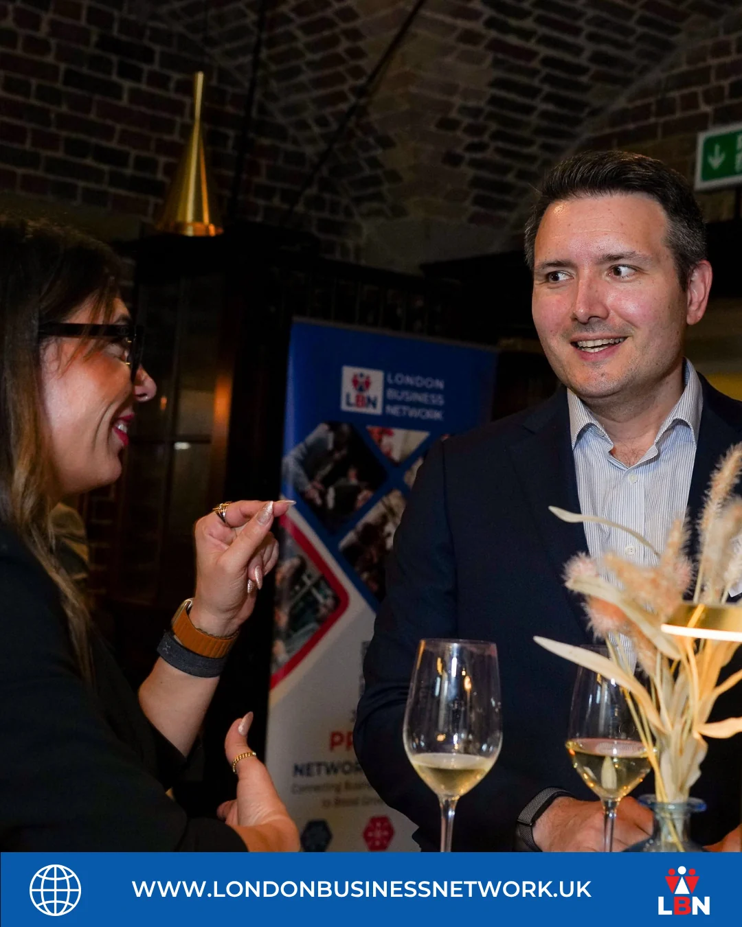 Two participants in conversation at the LBN Nordic Edge event